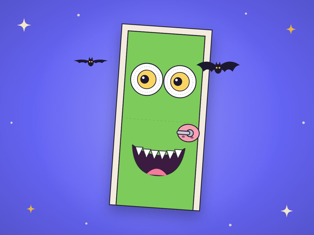 A door turned into a green monster, with paper-plate eyes and a toothy grin